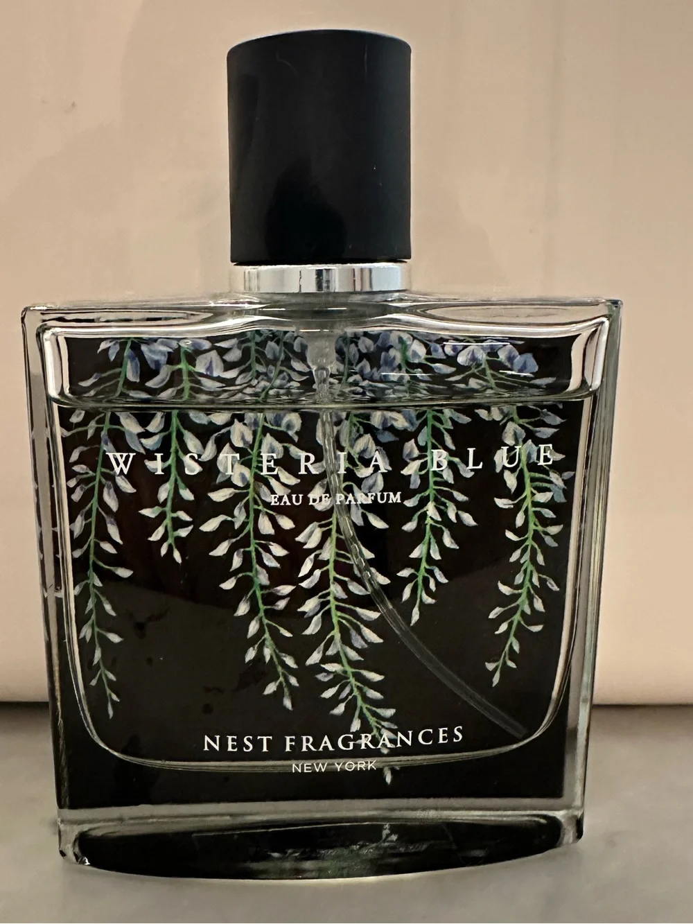 NEST Fragrances Wisteria Blue Bottle in Black with Green Accents
